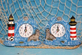 Leuchtturm mit Seehund und Uhr ca.12cm 2-fach sort. Poly