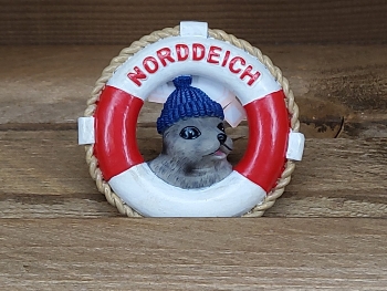 Magnet Seehund mit Mütze im Rettungsring